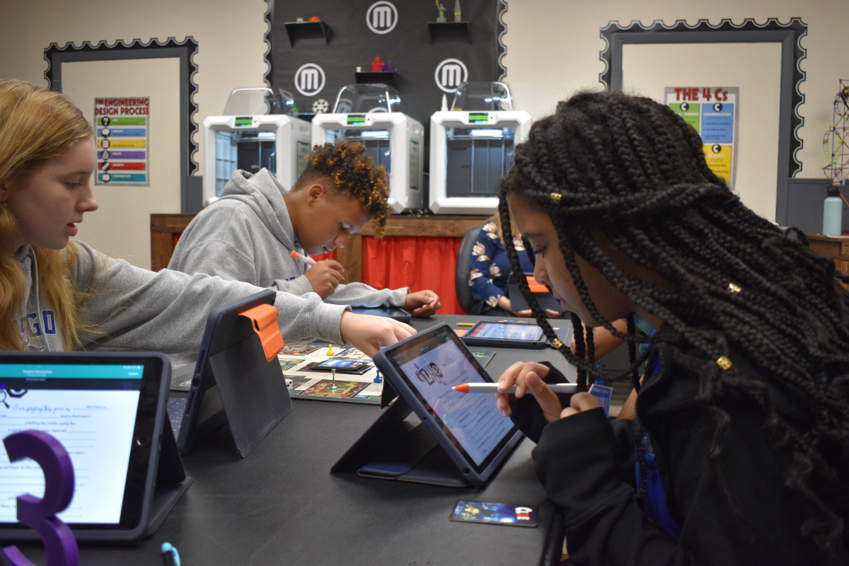 students working on ipads